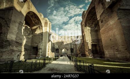 Panorama inside the Baths of Caracalla, Rome, Italy. It is a famous landmark of Rome. Amazing hdr view of the great ancient ruins of Caracalla`s Therm Stock Photo